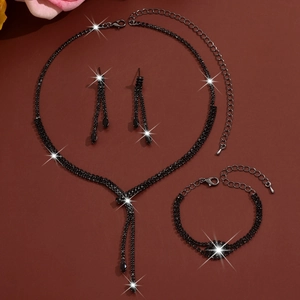 Detailed view of the sparkling black rhinestone jewelry set with tassel earrings