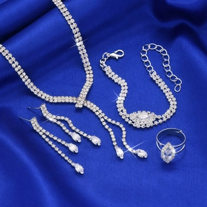 Sparkling silver zircon jewelry set with necklace, earrings, bracelet, and ring for brides