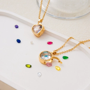 Vintage 18k gold locket necklace with transparent heart and round pendant set