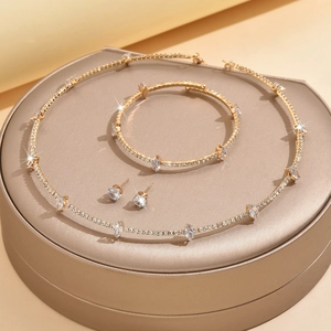 Luxurious French gold jewelry set with crystal necklace bracelet and stud earrings