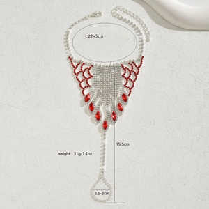 Detail showing the dimensions and red gemstone of the crystal layered foot chain