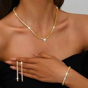 Parure de bijoux tennis dorée élégante avec collier et bracelet ornés de zircons