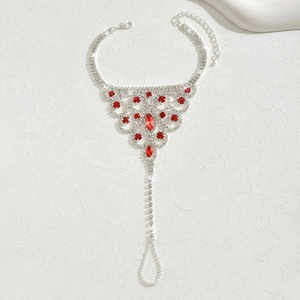 Elegant silver finger chain anklet with vibrant red gemstones and sparkling rhinestones