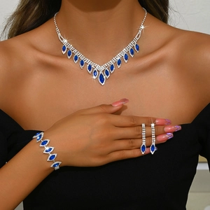 Elegant silver bridal jewelry set with navy blue marquise stones for wedding attire