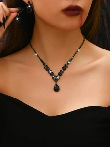 Gothic black bridal jewelry set featuring a water drop necklace and matching drop earrings