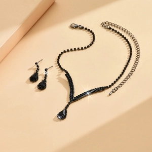 Elegant Halloween bridal jewelry set featuring black rhinestone necklace and teardrop earrings