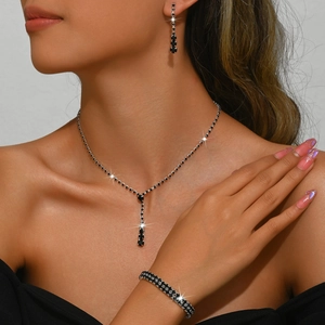 Sparkling black rhinestone jewelry set with Y-necklace, drop earrings, and bracelet