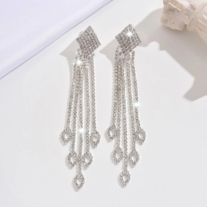Sparkling long diamond fringe earrings with hollow teardrop tassels in silver finish