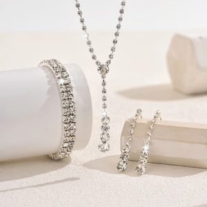 Exquisite silver bridal jewelry set with sparkling rhinestone necklace and tassel earrings