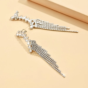 Long silver tassel earrings with sparkling rhinestones in a modern geometric fringe design