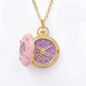 Detail of donut-shaped pocket watch pendant with pink enamel and roman numerals