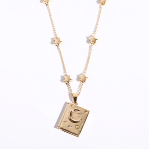 Golden celestial book pendant necklace with moon stars and rhinestones in high polish finish