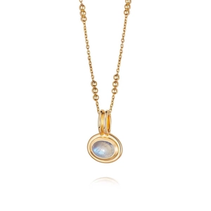 Close-up of a gold multi-layer necklace with beaded chain and oval moonstone pendant