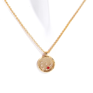 18K gold plated necklace with a hammered zodiac pendant featuring red and white zircons