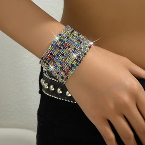 Close-up of sparkling multilayer colorful rhinestone stretch bracelets on a wrist
