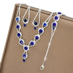 Elegant silver jewelry set with deep blue round rhinestones and necklace bracelet earrings