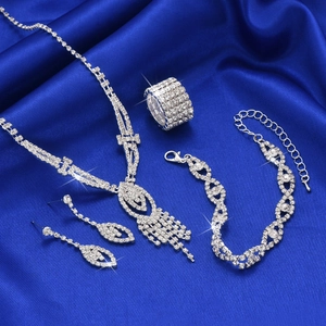 Silver-plated rhinestone jewelry set with tassel necklace, bracelet, earrings and ring