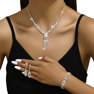Elegant rhinestone jewelry set with tassel necklace, drop earrings and bracelet