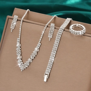 Sparkling wedding jewelry set with rhinestone necklace, earrings, bracelet and ring