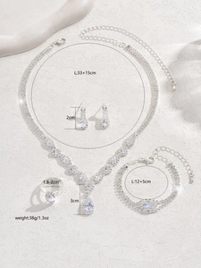 Close-up of elegant silver necklace set with teardrop zircon and detailed dimensions