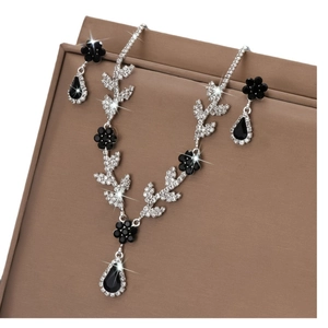 Set gioielli da sposa floreali con strass scintillanti e cristalli neri eleganti