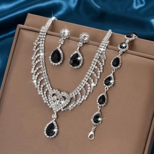 Luxury rhinestone teardrop tassel jewelry set with black pear-cut gemstones and silver finish