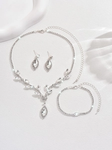 Detail of silver V-shaped bridal necklace set with sparkling water drop rhinestones