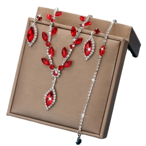 Elegant bridal jewelry set with V-shaped silver necklace, red marquise stones and earrings