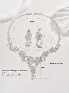 Detailed view of teardrop crystal bridal jewelry set with dimensions and weight