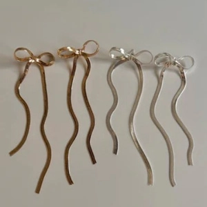 Orecchini A Fiocco Con Nappa In Acciaio Inossidabile Catena A Serpente Gioielli Di Moda Minimalista Di Nicchia Per Donna