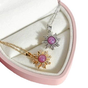 Zonnester hanger ketting met paarse opaal en sprankelende zirkoon in goud en zilver