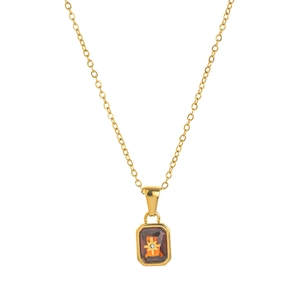 Collana Stella Polare in titanio dorato con pietra portafortuna arancione e stelle