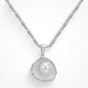 Detail of silver-toned shell pendant with white pearl inlay and oval chain link necklace