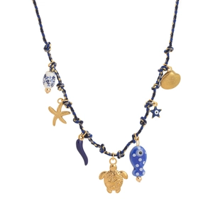 Close-up of woven chain necklace with sea star, turtle, fish and shell charms