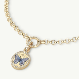 Elegant gold necklace with oval blue butterfly pendant and sparkling crystal diamonds