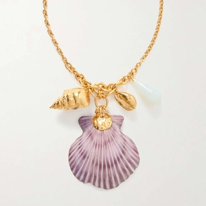 Golden summer beach necklace featuring purple seashell and conch charms on white background