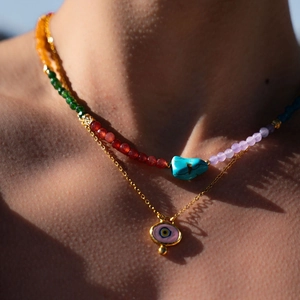 Layered 18k gold plated necklace with colorful beads and pink evil eye pendant
