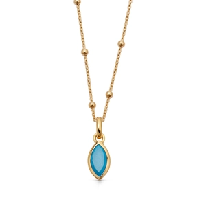 Close-up of marquise-cut turquoise stone on 18K gold plated beaded chain necklace