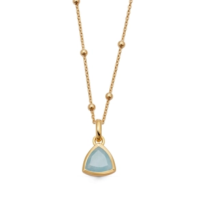 Detail of 18K gold plated beaded chain with a triangular light blue zircon stone pendant