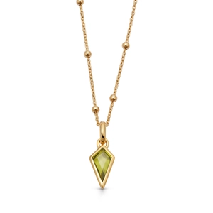 Macro detail of kite-cut green stone pendant on elegant 18K gold plated beaded chain