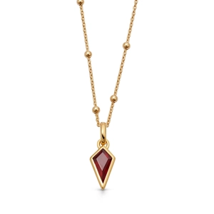 Detail of 18K gold plated bead chain with a kite-shaped red zircon gemstone pendant