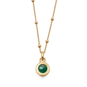 Close-up of 18K gold satellite chain with a round emerald green zircon pendant necklace