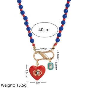 Parure de collier en perles colorées avec pendentif cœur œil maléfique et cristal bleu