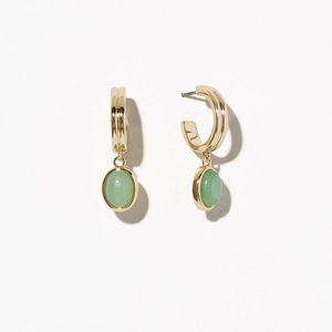 Vintage gold hoop earrings with oval green aventurine stone pendant on white background