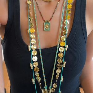 Handmade ethnic Tibetan necklace set with gold pendants and turquoise braided cords