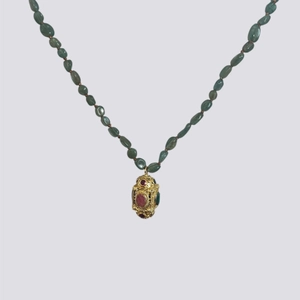 Ethnic Tibetan necklace with green stone beads and vintage gold filigree pendant