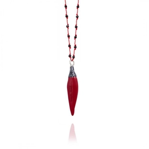 Detail of red chili pepper pendant with enameled glaze on a beaded cord necklace