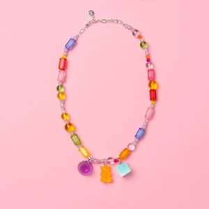 Colorful beaded gummy bear necklace with blue, red, and green resin beads and floral charms