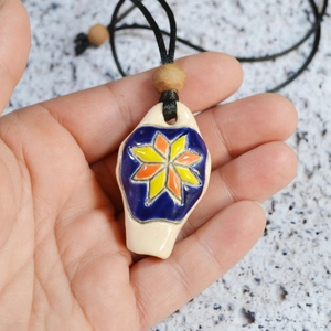 Handmade ceramic whistle necklace with star pattern and black cord pendant for women