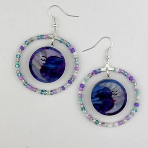 Bohemian silver hoop earrings with moon pendant and colorful beaded accents